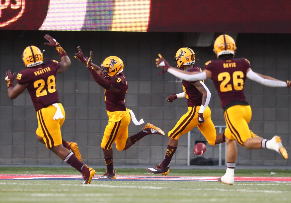 Dec 11, 2020; Tucson, Arizona, USA; Arizona State Sun Devils running back Demetrious Flowers (9) celebrates after returning the opening kickoff for a touchdown against the Arizona Wildcats during the Territorial Cup at Arizona Stadium.